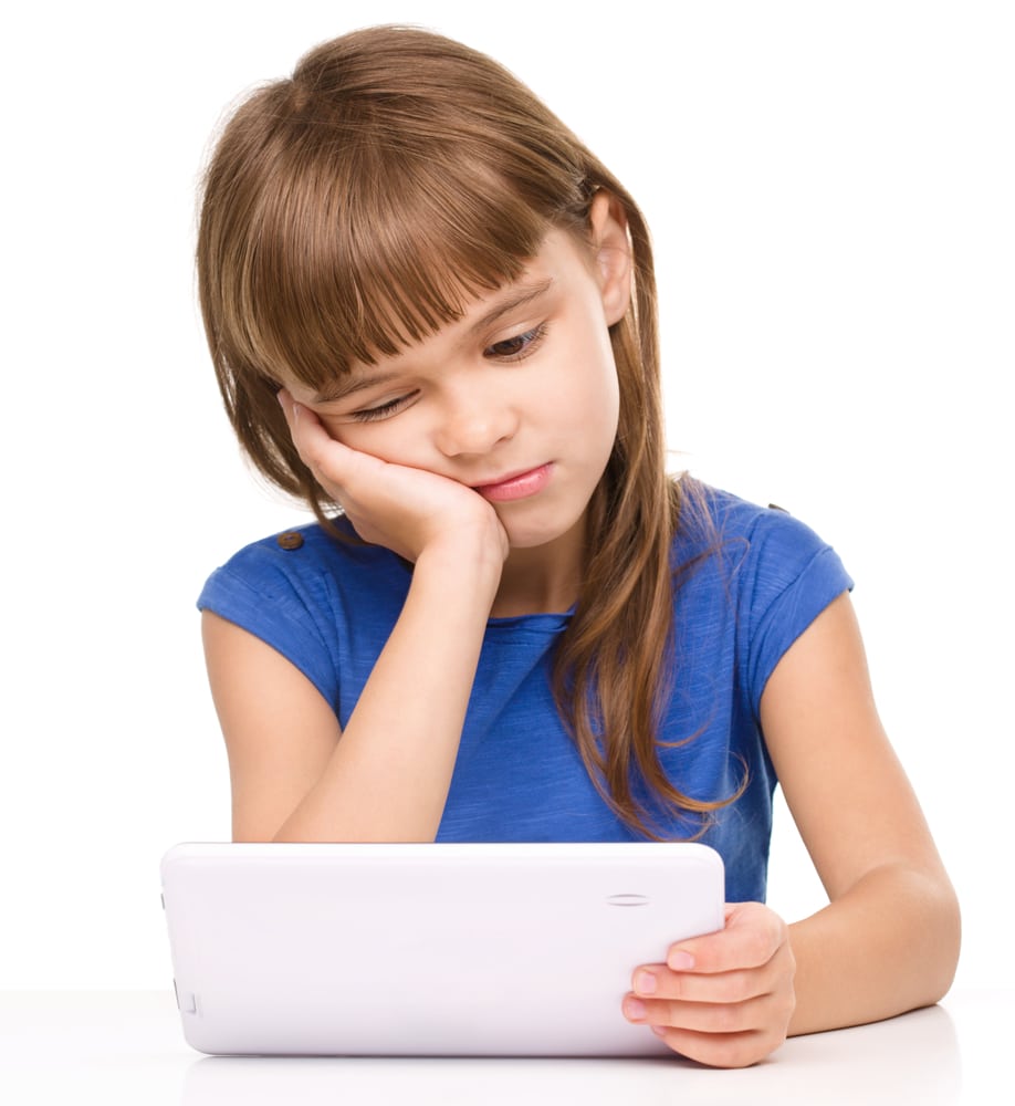 Young girl is using tablet Depositphotos 35876353 m 2015